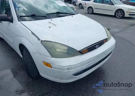 2004 Ford Focus Se z USA, uszkodzony, nr VIN 1FAFP34Z14W145170